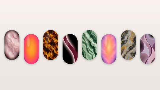 Printed nail-art swatches in marble, aura, tortoiseshell and wave designs on a neutral background